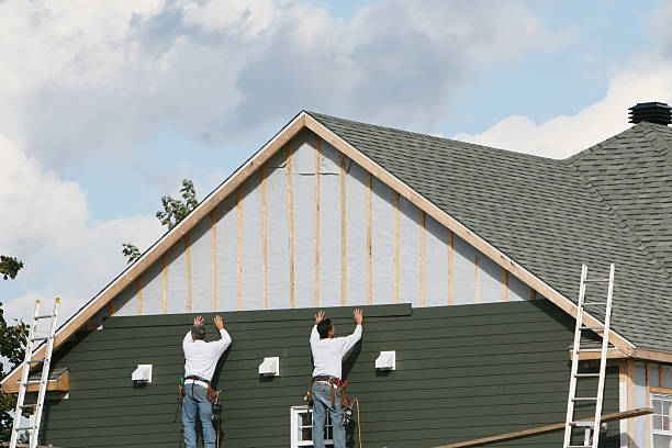 Professional Siding technician working in New Canton, VA
